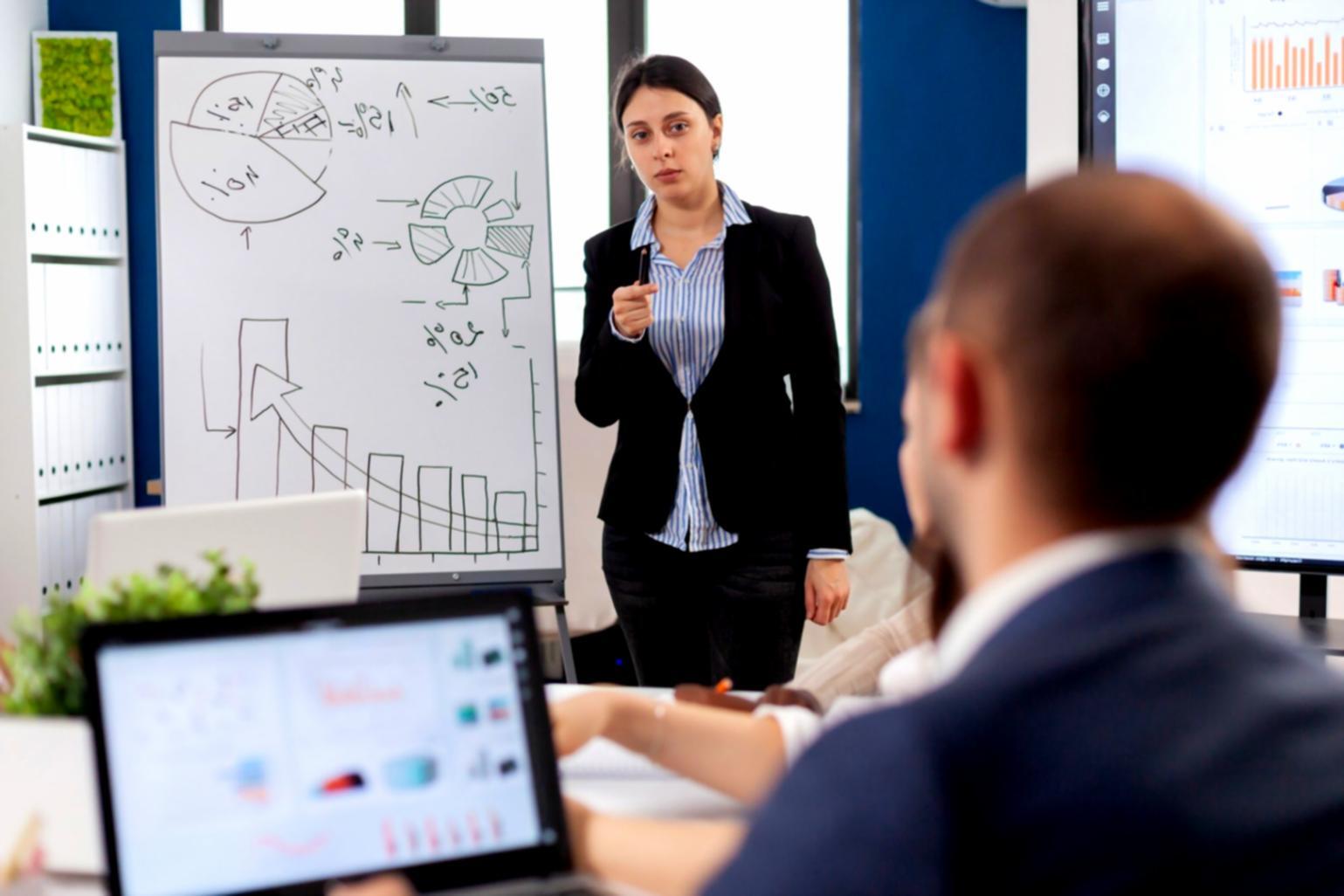 Australian household reviewing budget planning documents together