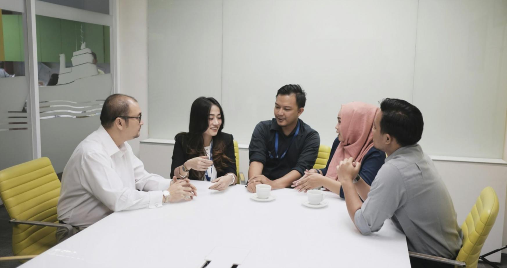 Budget planning documents with calculator and notes